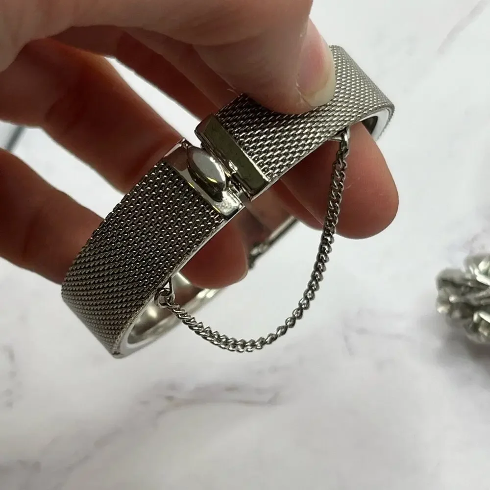 Set of 11 silver and gold tone bracelets